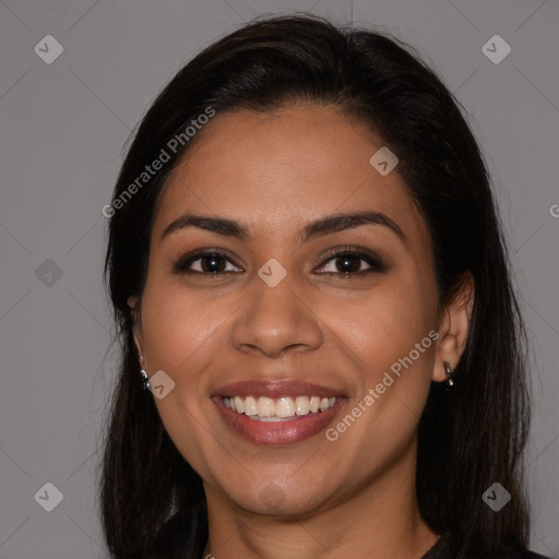 Joyful latino young-adult female with long  brown hair and brown eyes