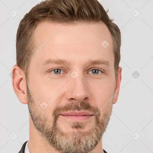 Joyful white adult male with short  brown hair and grey eyes