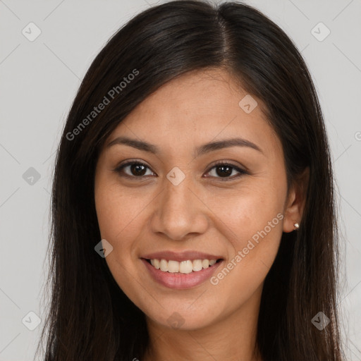 Joyful white young-adult female with long  brown hair and brown eyes