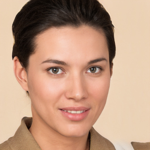 Joyful white young-adult female with short  brown hair and brown eyes