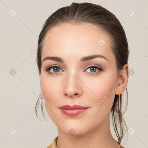 Neutral white young-adult female with long  brown hair and brown eyes