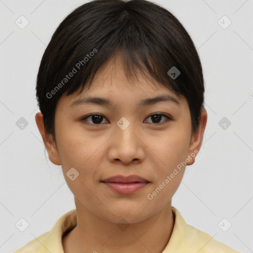 Joyful asian young-adult female with short  brown hair and brown eyes