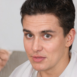 Neutral white adult male with short  brown hair and brown eyes