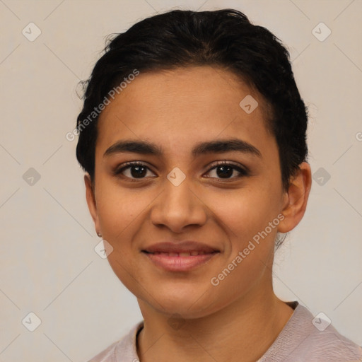 Joyful latino young-adult female with short  black hair and brown eyes