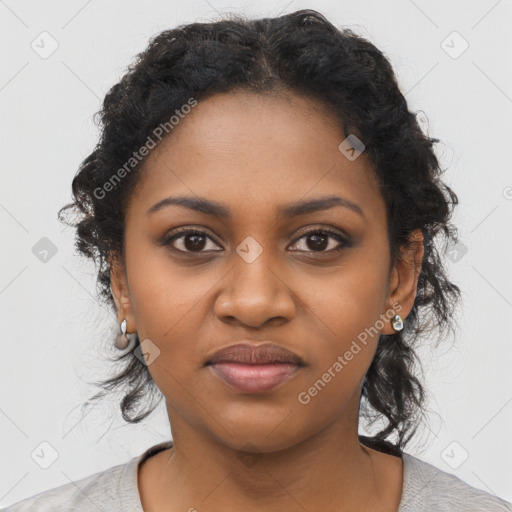 Joyful black young-adult female with medium  black hair and brown eyes