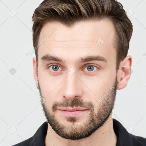 Neutral white young-adult male with short  brown hair and grey eyes