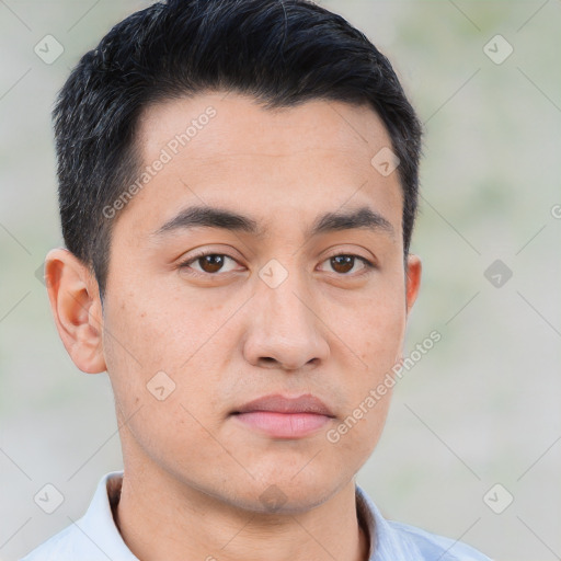 Neutral white young-adult male with short  black hair and brown eyes