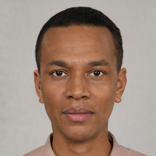 Neutral black young-adult male with short  black hair and brown eyes