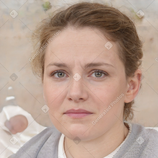 Joyful white young-adult female with medium  brown hair and blue eyes