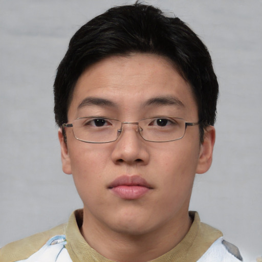 Neutral asian young-adult male with short  brown hair and brown eyes