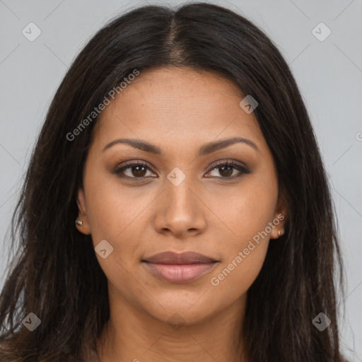 Joyful latino young-adult female with long  brown hair and brown eyes