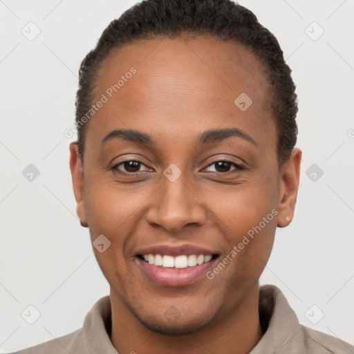 Joyful black young-adult female with short  brown hair and brown eyes