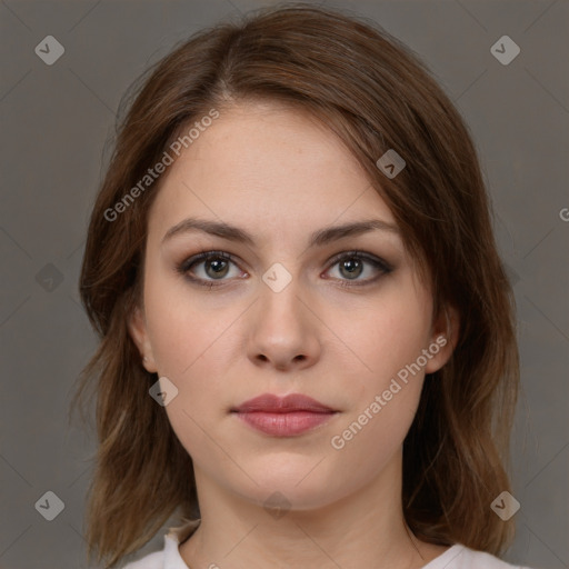 Neutral white young-adult female with medium  brown hair and brown eyes