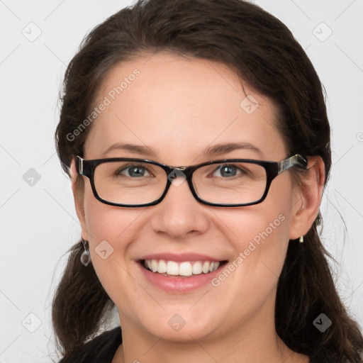 Joyful white young-adult female with medium  brown hair and grey eyes