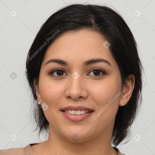 Joyful latino young-adult female with medium  brown hair and brown eyes