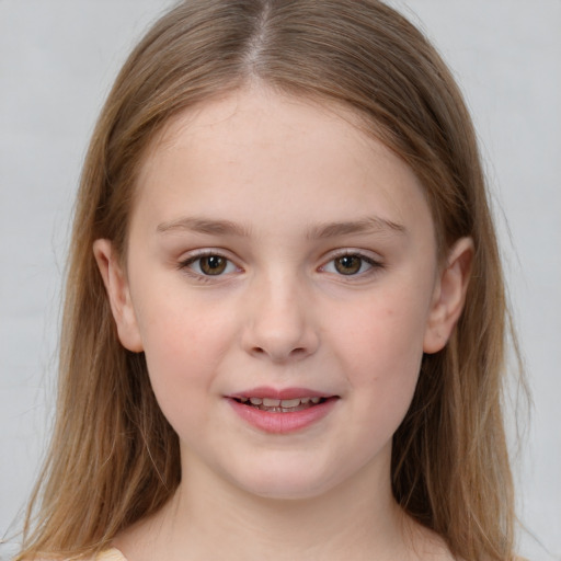 Joyful white child female with medium  brown hair and brown eyes