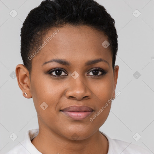 Joyful black young-adult female with short  brown hair and brown eyes