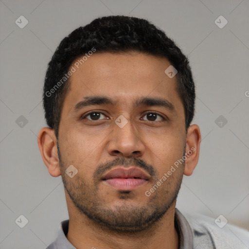 Neutral latino young-adult male with short  brown hair and brown eyes