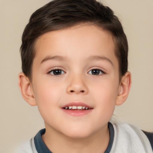 Joyful white child male with short  brown hair and brown eyes