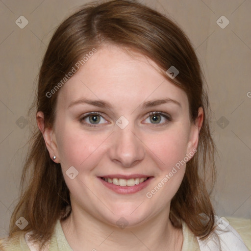 Joyful white young-adult female with medium  brown hair and blue eyes