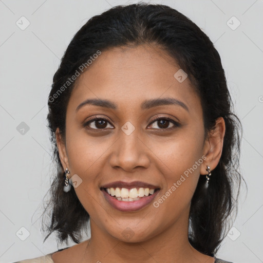 Joyful latino young-adult female with medium  black hair and brown eyes