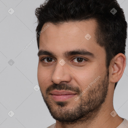 Joyful white young-adult male with short  black hair and brown eyes