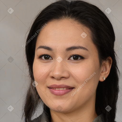 Joyful latino young-adult female with medium  brown hair and brown eyes