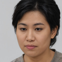 Neutral asian young-adult female with medium  brown hair and brown eyes