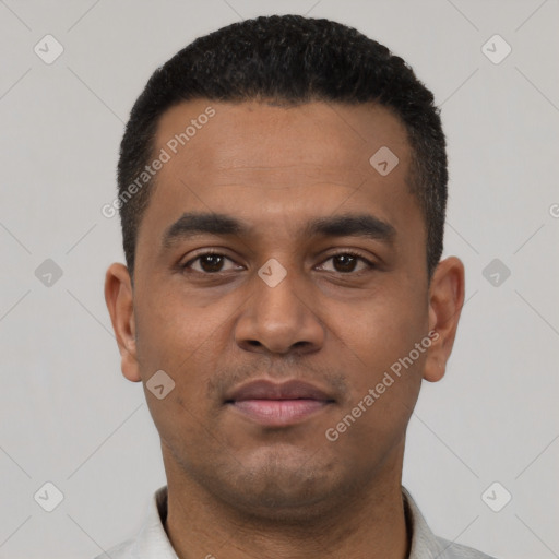 Neutral latino young-adult male with short  black hair and brown eyes
