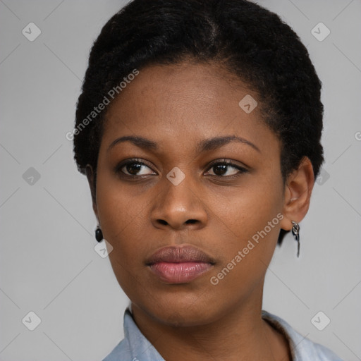 Neutral black young-adult female with short  black hair and brown eyes