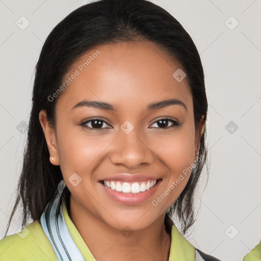 Joyful latino young-adult female with medium  brown hair and brown eyes