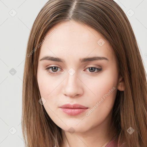 Neutral white young-adult female with long  brown hair and brown eyes