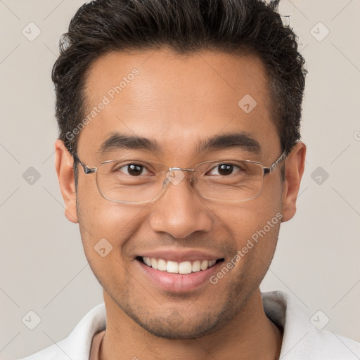 Joyful white young-adult male with short  brown hair and brown eyes