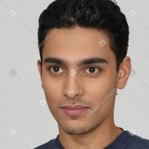 Neutral latino young-adult male with short  black hair and brown eyes