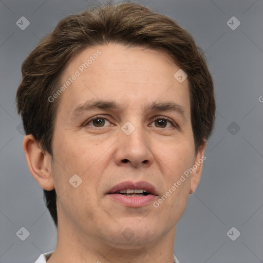 Joyful white adult male with short  brown hair and grey eyes