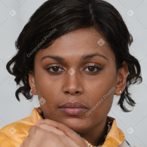 Neutral black young-adult female with medium  brown hair and brown eyes