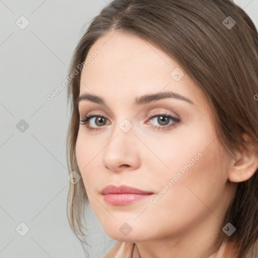 Neutral white young-adult female with long  brown hair and brown eyes