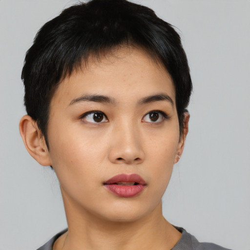 Neutral asian young-adult female with short  black hair and brown eyes