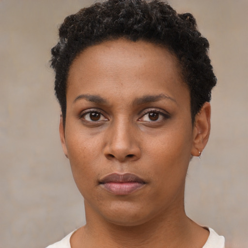 Neutral black young-adult female with short  brown hair and brown eyes