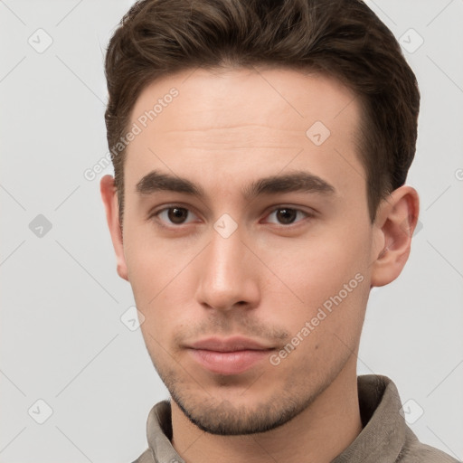 Neutral white young-adult male with short  brown hair and brown eyes