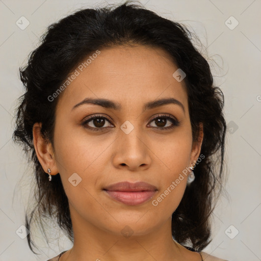 Joyful latino young-adult female with medium  brown hair and brown eyes