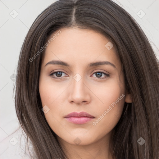 Neutral white young-adult female with long  brown hair and brown eyes