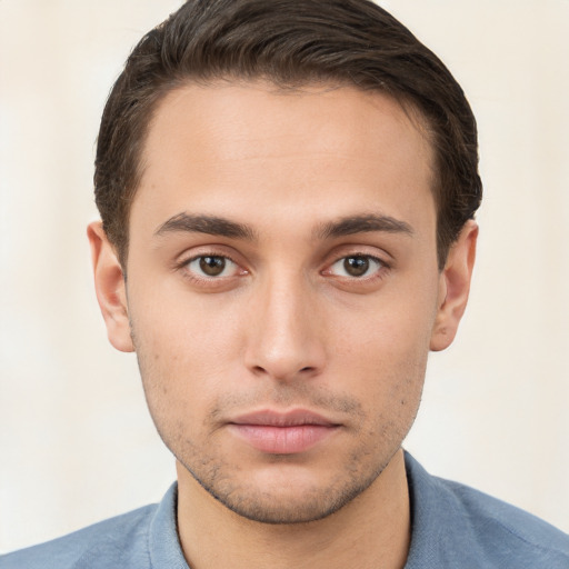 Neutral white young-adult male with short  brown hair and brown eyes