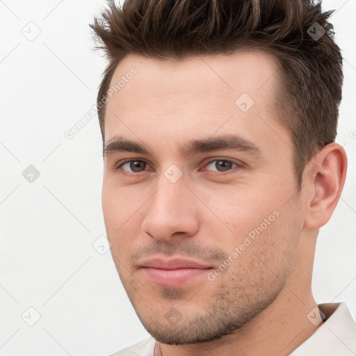 Neutral white young-adult male with short  brown hair and brown eyes