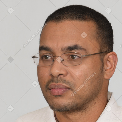 Neutral white adult male with short  black hair and brown eyes