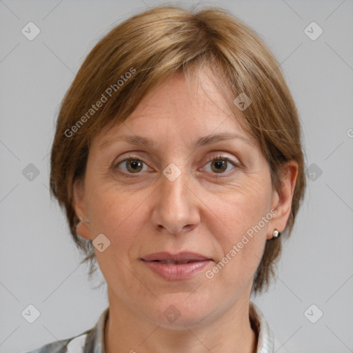 Joyful white adult female with medium  brown hair and grey eyes