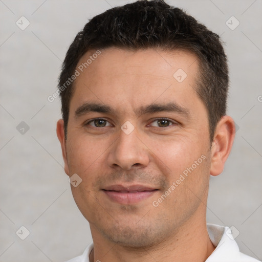 Joyful white young-adult male with short  brown hair and brown eyes