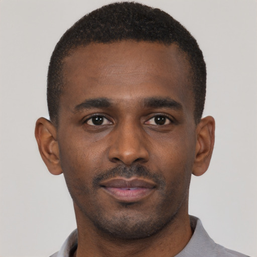 Neutral black young-adult male with short  black hair and brown eyes