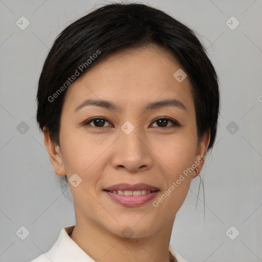 Joyful asian young-adult female with short  brown hair and brown eyes