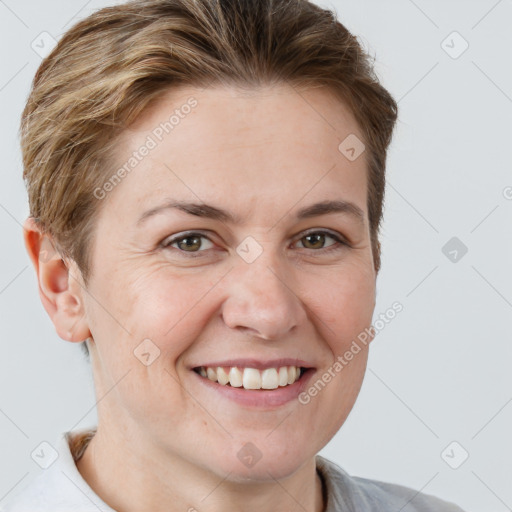 Joyful white adult female with short  brown hair and grey eyes